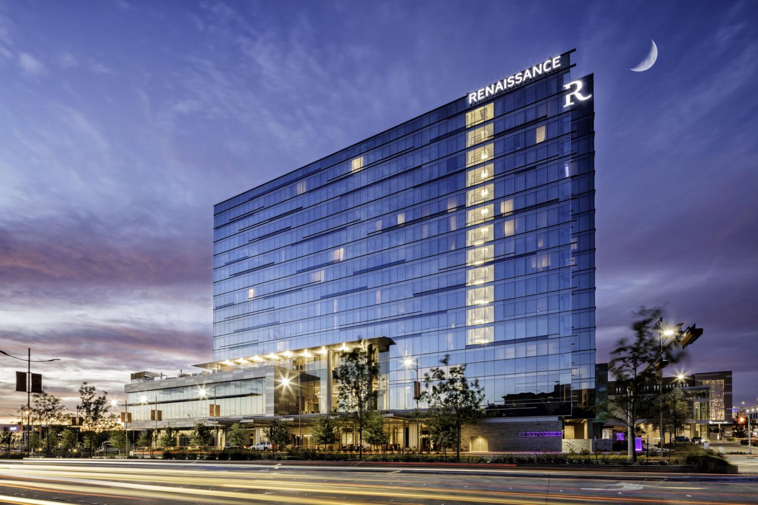 Renaissance Hotel night exterior with blue-red Skys