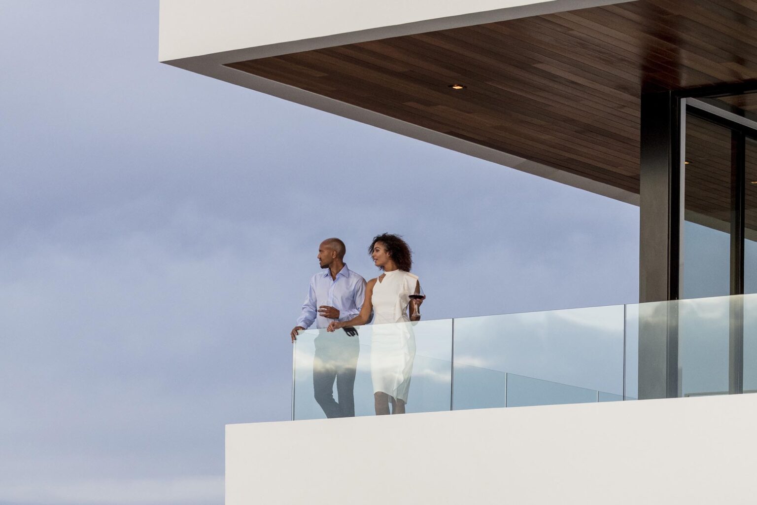 Hotel guests enjoying the view on a private terrace