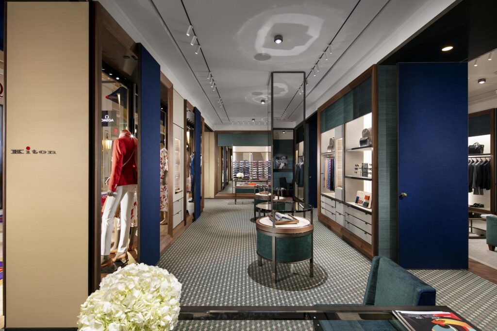 Overall view of Kiton flagship store with blue and green color scheme Paris, France